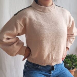 Sweater con apliques